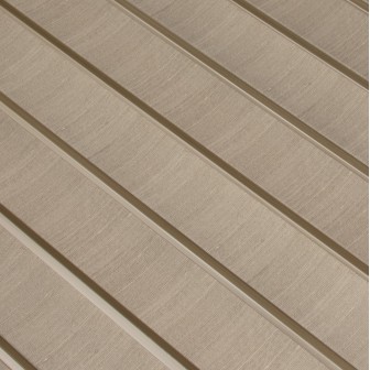 Panou decorativ riflat 3D amber și bej într-un dormitor modern