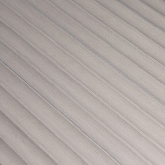 Panou decorativ riflat 3D gri într-un living modern