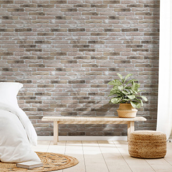 Panou decorativ cu aspect de cărămidă aparentă într-un dormitor modern
