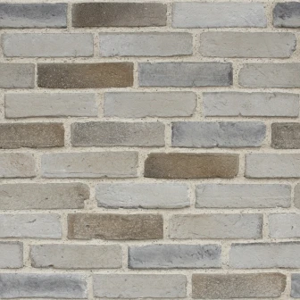 Panou decorativ cărămidă aparentă în nuanțe de gri și bej, creând un ambient rustic și modern.