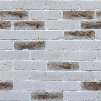 Panou decorativ cărămidă aparentă alb antichizat într-un dormitor modern