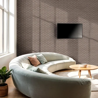 Panou decorativ cărămidă aparentă maro într-un living modern